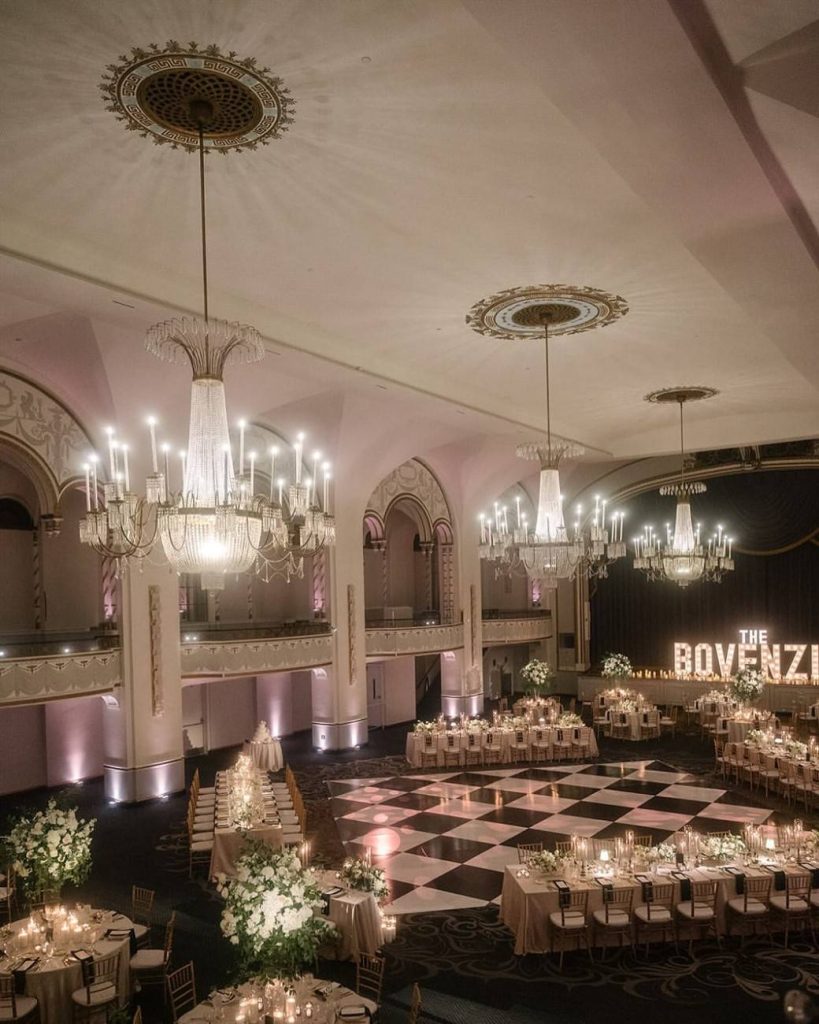 Wedding dance floor installation before reception celebration