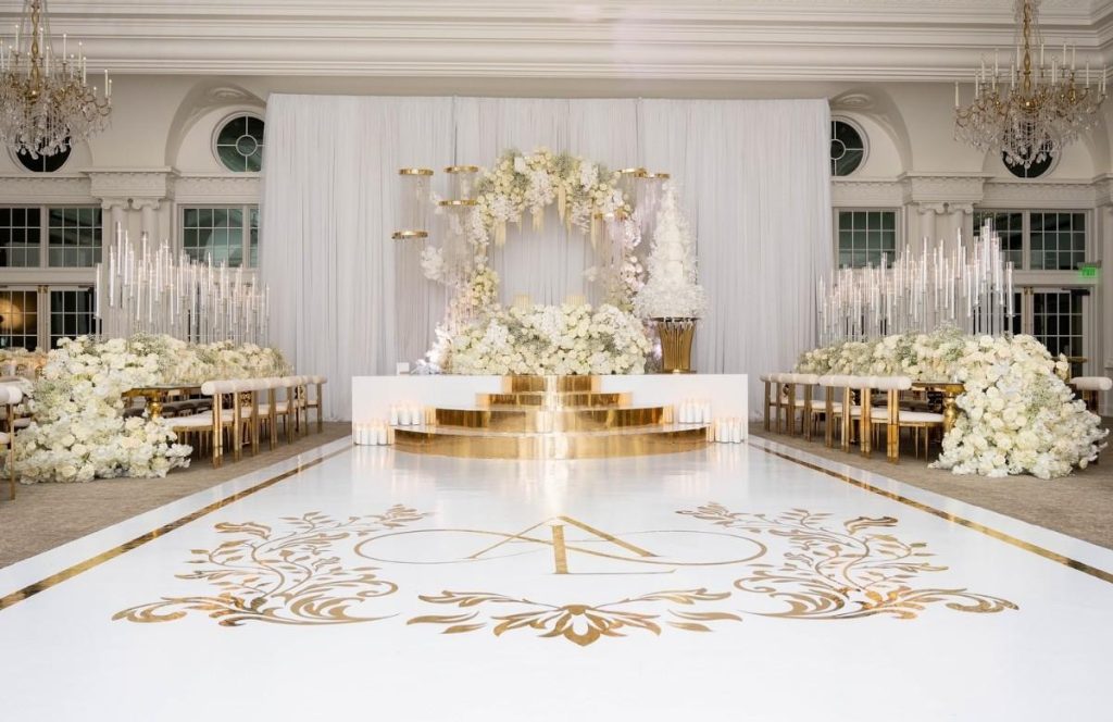 Vinyl dance floor wrap enhancing luxury wedding atmosphere