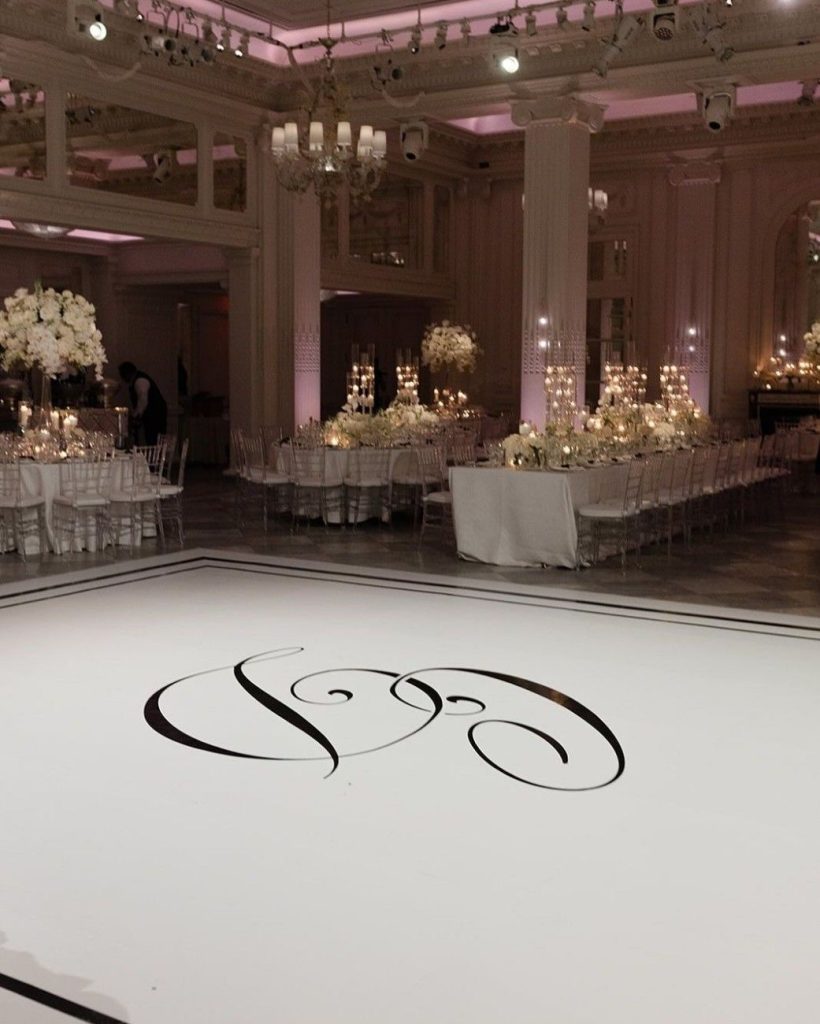 Elegant custom dance floor wrap with personalized monogram design