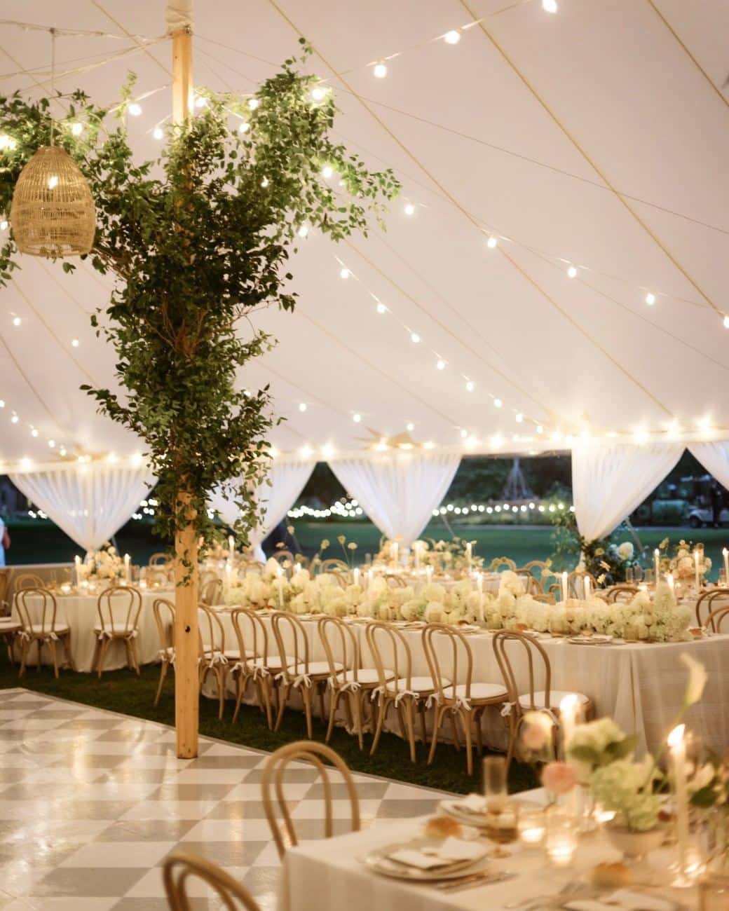 outdoor wedding dance floor wrap under glowing sailcloth tent